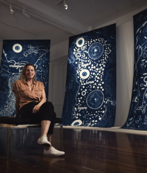 Woman sitting in a museum Image